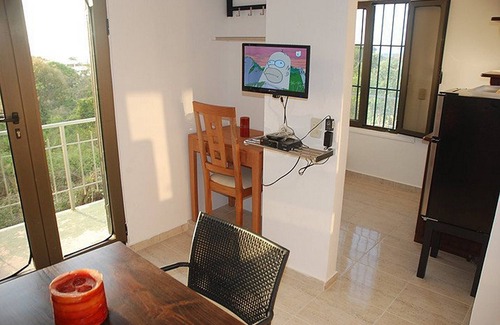 Los Cerros Apartment | Quiet studio on top of the hill, pool/Wi-Fi/cable TV.
