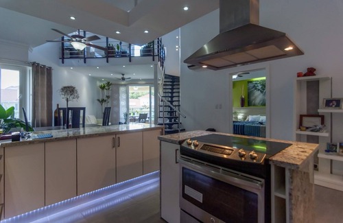 El Batey Apartment | Top-floor penthouse in beachfront residence, steps to all shops and restaurants