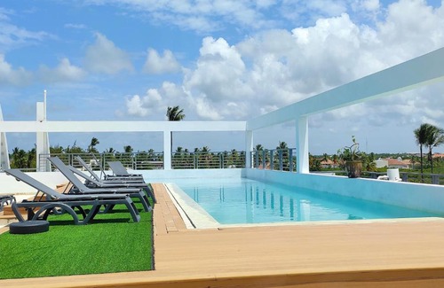Bavaro Apartment | TROPICAL SUITES with ROOFTOP POOL, BEACH CLUB, SPA, RESTAURANTS