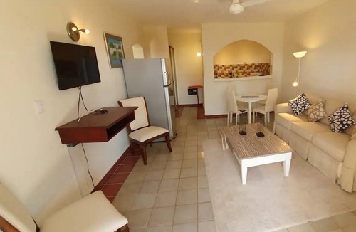 Playa Chiquita Apartment | 1BD condo with extra-large pool in guest-friendly resort near ocean