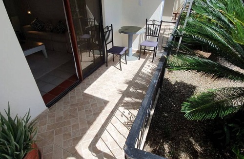 Playa Chiquita Apartment | 1BD condo with extra-large pool in guest-friendly resort near ocean