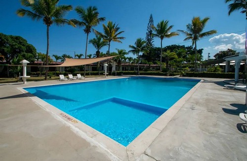 Playa Chiquita Apartment | 1BD condo with extra-large pool in guest-friendly resort near ocean