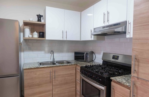 Santiago de los Caballeros Apartment | 2 Air conditioned rooms at Baia Residences in Santiago