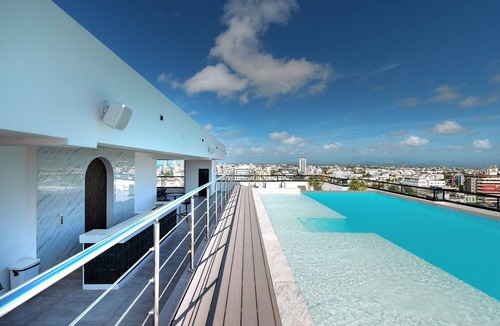Santo Domingo Condo | 2-Bedroom Comfort with Rooftop Pool Views