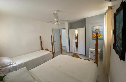 Cofresi Villa | 2 BR & 1WR Suite at Villa Costa Verde near Playa Cofresi, Puerto Plata with a pool, balcony, and a rooftop terrace