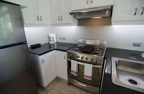 El Batey Apartment | 2BD guest-friendly apartment on sandy beach, near shops&restaurants!