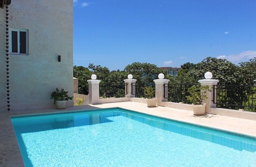 Playa Chiquita Apartment | 2BD luxury condo on sandy beach, with pool/gym/tennis/basket!