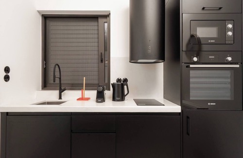 Gazi Apartment | 2BR Suite Apt Acropolis Rooftop Views By Metro