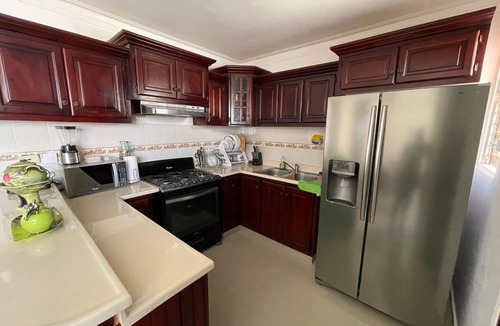 Gregorio Luperon House | 3 bedroom furnished apartment with pool gym parking 24 hours security