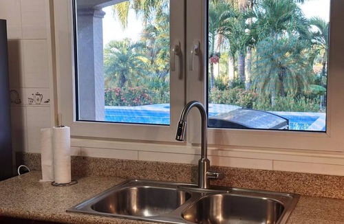 Urbanizacion Tavarez Villa | 3BD/3BA central villa w/pool, parking & sports courts