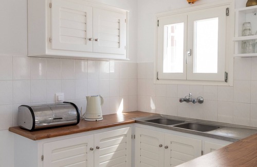 Naousa Apartment | A boutique seaside apartment at Kolimbithres with a captivating patio sea view.