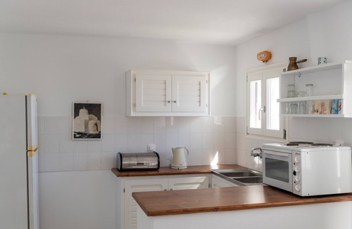 Naousa Apartment | A boutique seaside apartment at Kolimbithres with a captivating patio sea view.