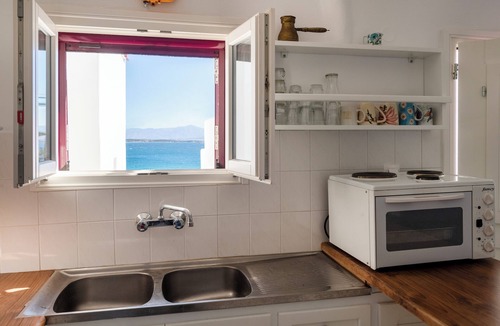Naousa Apartment | A boutique seaside apartment at Kolimbithres with a captivating patio sea view.