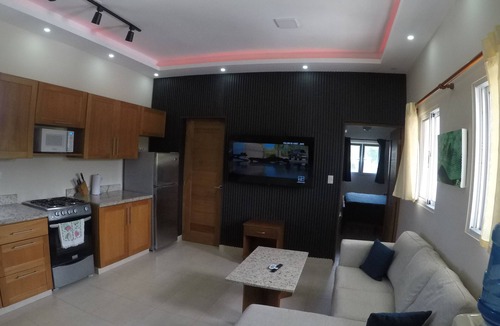 Los Cerros Condo | A downtown modern fully furnished Sosua Condo with a Cigar Lounge and bar.