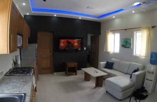 Los Cerros Condo | A downtown modern fully furnished Sosua Condo with a Cigar Lounge and bar.