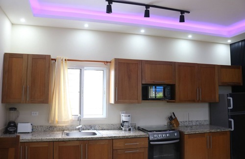 Los Cerros Condo | A downtown modern fully furnished Sosua Condo with a Cigar Lounge and bar.