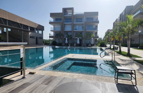 San Pedro de Macoris Apartment | A dreamy vacation apartment, steps from private beach.