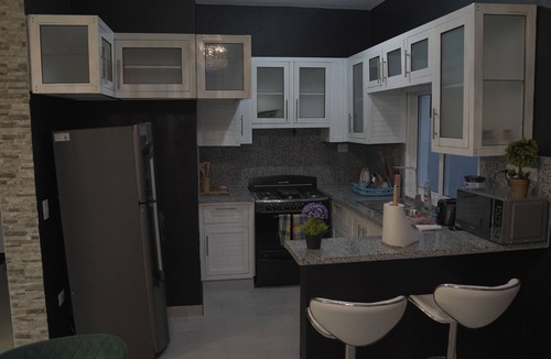 Urbanizacion Tavarez Villa | A modern 2-bedroom villa with pool and lounge area