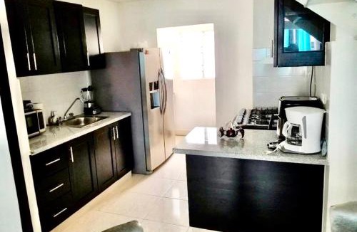 Licey al Medio Apartment | Acogedor apartment , seguridad las 24 horas , Cibao International Airport 8 minutos, Centro de Santiago 10 Minutos , Tamboril la capital mundial del cigarro 10 minutos
