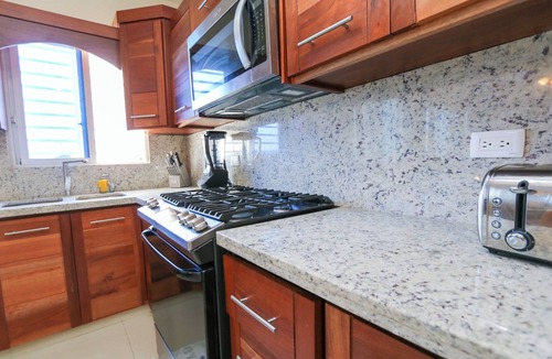 San Cristobal Apartment | Amazing 2BR/2Bt APT hot water, AC,Garage and Patio
