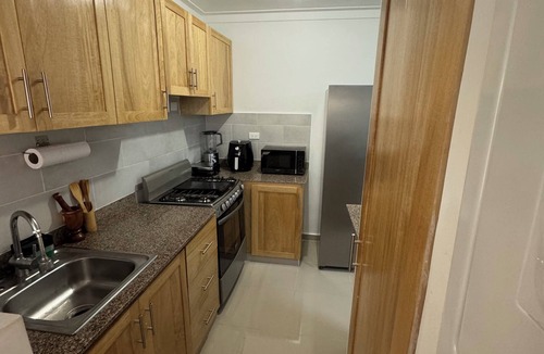 Santo Domingo Oeste Apartment | Apartamento nuevo con WI-FI + TV 4K 65" + gimnasio + parqueo Santo Domingo Oeste