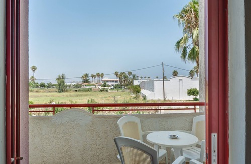 Tingaki Apartment | Apartment 'Golden Sun Two-bedroom Apt 4' with Sea View, Shared Pool and Wi-Fi