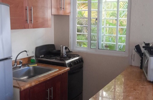 Costambar Apartment | Apartment in a beautiful tropical garden, 2 minutes walk to the beach.