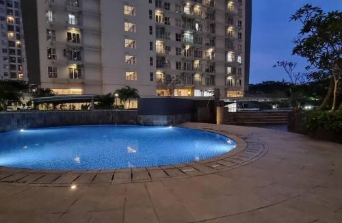 Bumi Serpong Damai Apartment | Apt Casa De Parco Studio Tema Gray With Wifi, Pool and Netflix
