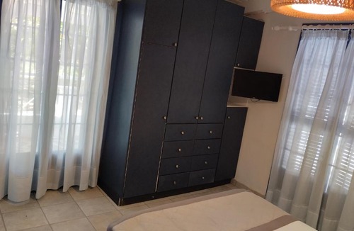 Melissopetra Apartment | arome de grenade