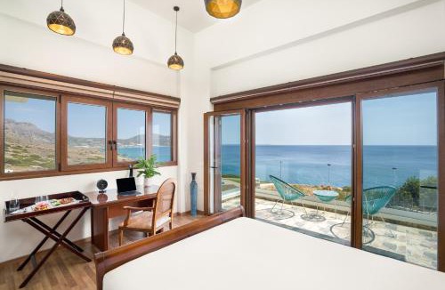 Goudhouros Villa | Beachfront Villa Atalandia with Heated Pools, Gym, BBQ & Office