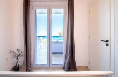 Alykes House | Beachfront wooden house in Zante