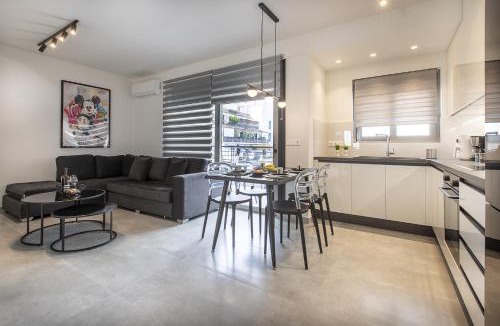 Ilisia Apartment | Black & White 2BR Apt steps from Mavili Square