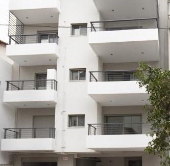 Ilisia Apartment | Black & White 2BR Apt steps from Mavili Square