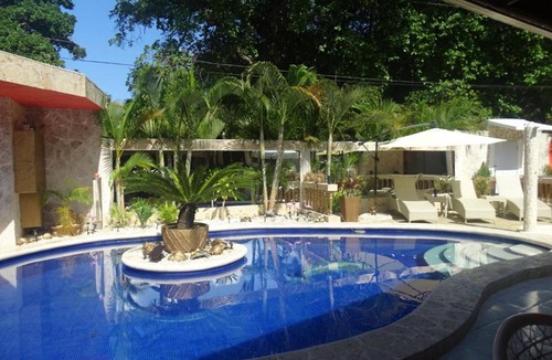 Playa Chiquita Apartment | Budget guest-friendly room near casino and beach