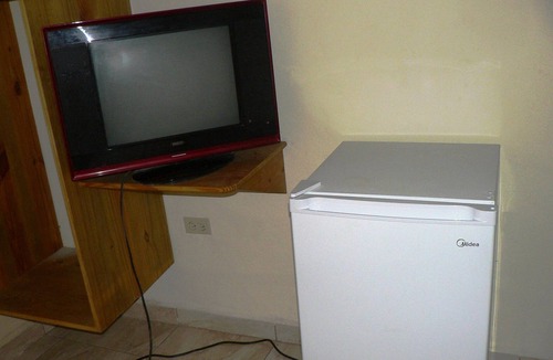 La Mulata Apartment | Budget room with cable TV/Internet in hotel with on-site restaurant