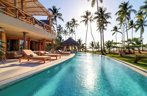 Puerto Bahia Villa | Casa La rodonda: 9 bedroom beachfront on spectacular sunset location.