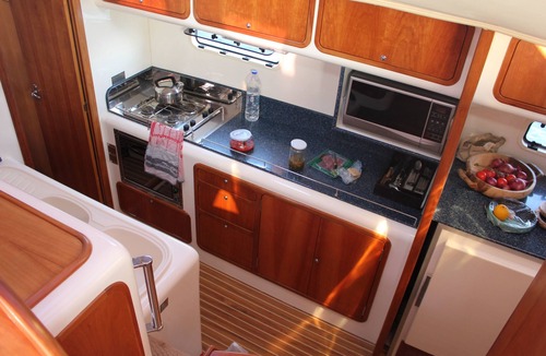 Old Town Naxos Boat Rental | Catamaran with skipper and hostess Cyclades