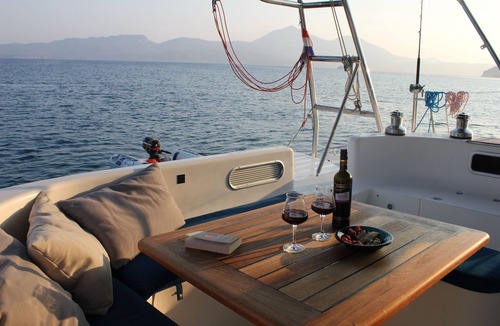 Old Town Naxos Boat Rental | Catamaran with skipper and hostess Cyclades