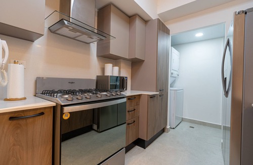 Ciudad Universitaria Apartment | Central and luxurious APT in Santo Domingo with services, pool, Wi-Fi and GYM