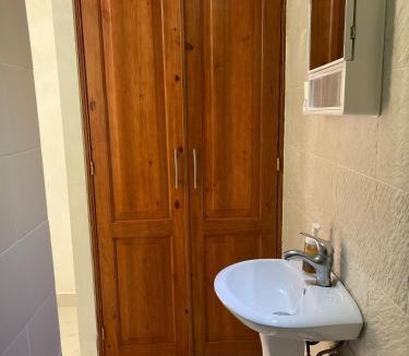 El Batey House | Central Area Bedroom With Common Kitchen, living room