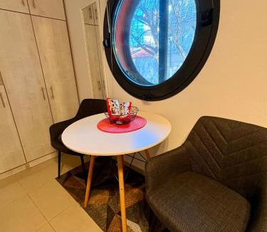 Edessa Apartment | Central & Riverfront Room 1