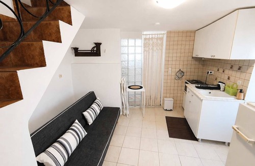Lefkes Apartment | Charming White House Retreat with Balcony in Paros Lefkes