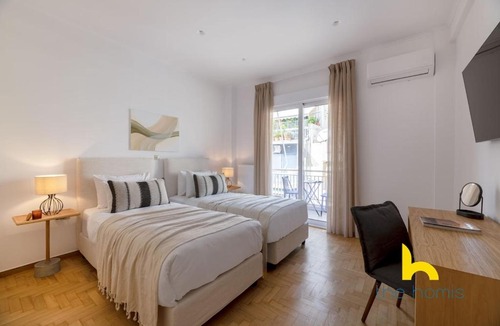 Filopappou Apartment | Chic Koukaki Haven Steps to Metro & Acropolis!