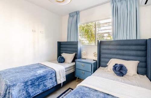 Llanos de Gurabo I Apartment | Chic Urban Retreat with Pool, Gym, & Free Parking