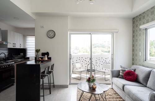 Lope De Vega Condo | City Center Piantini W/Pool, WiFi By YellowKey