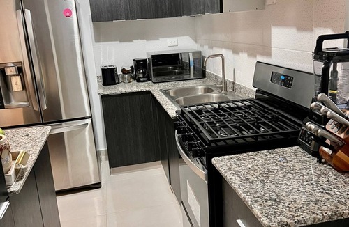 Villa Mella Apartment | Condo confortable avec piscine, votre oasis de confort à Santo Domingo Nord