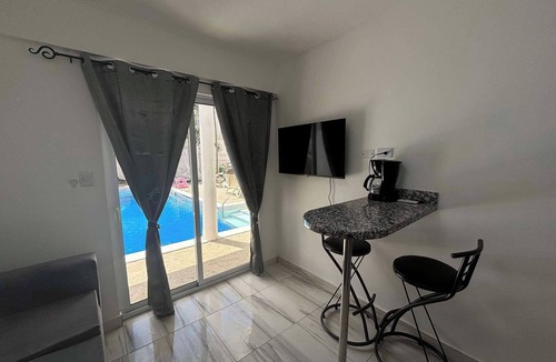 El Batey Apartment | Condo facing the pool in the heart of Sosua