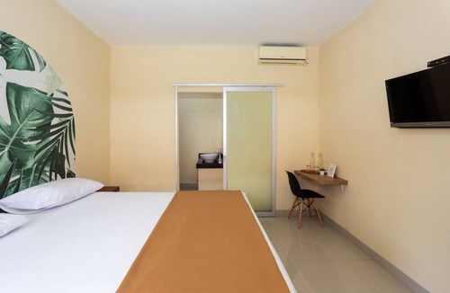 Denpasar Barat House | Cozy co-living that has two buildings separated by a pool to cool down and relax