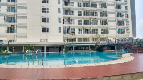 Bumi Serpong Damai Apartment | Elegant Studio at Casa De Parco Apartment By Travelio