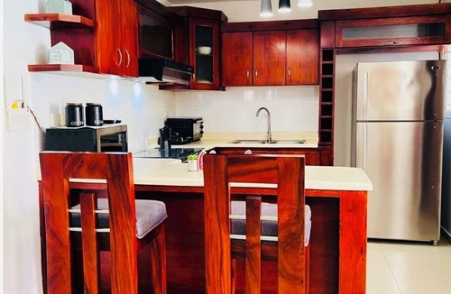 Punal Apartment | “ Enjoy Your Coffee with Poolside Views at Harmony II – Balcony Bliss"